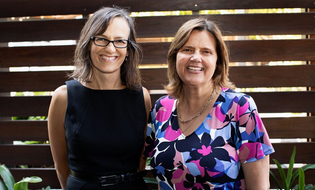 A picture of The Disability Trust CEO Carol Berry standing next to ermha365 CEO Karenza Louis-Smith